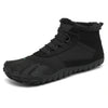 Bota Saguaro Will I negra vista lateral mostrando diseño barefoot de invierno.