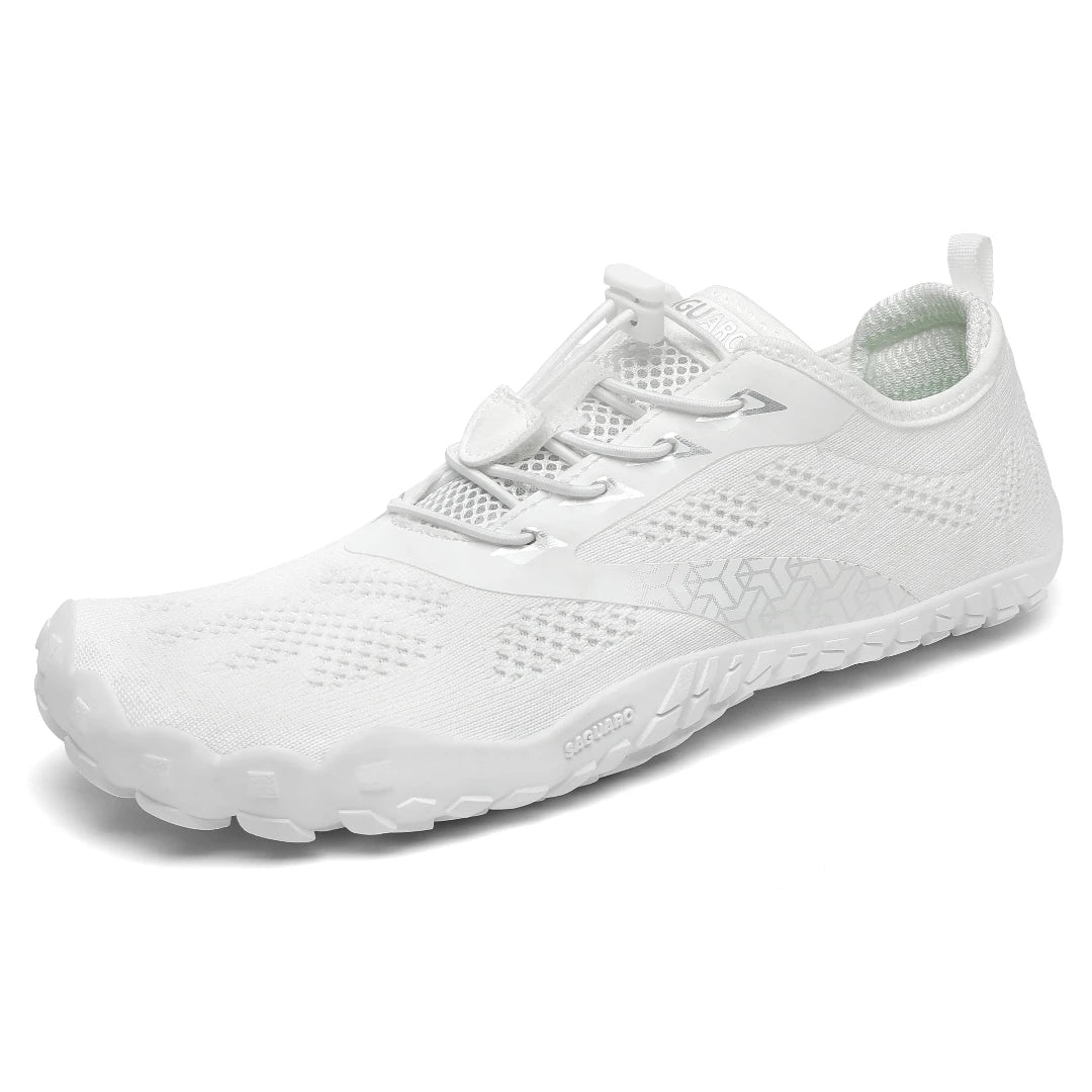 Zapatillas Saguaro Smart I blancas vista lateral con diseño barefoot minimalista.