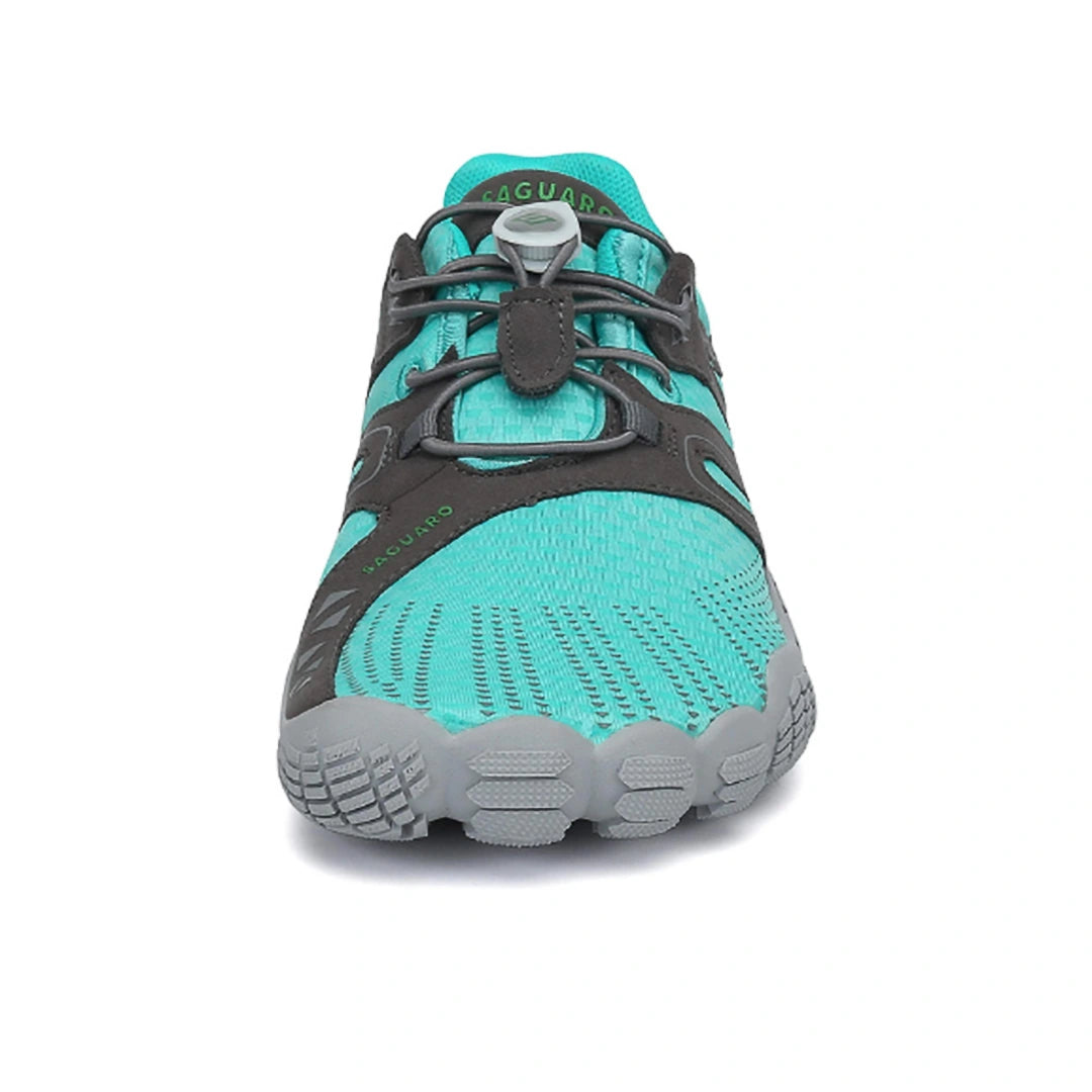 Zapatillas Vitality IV turquesa vista frontal destacando puntera amplia barefoot.
