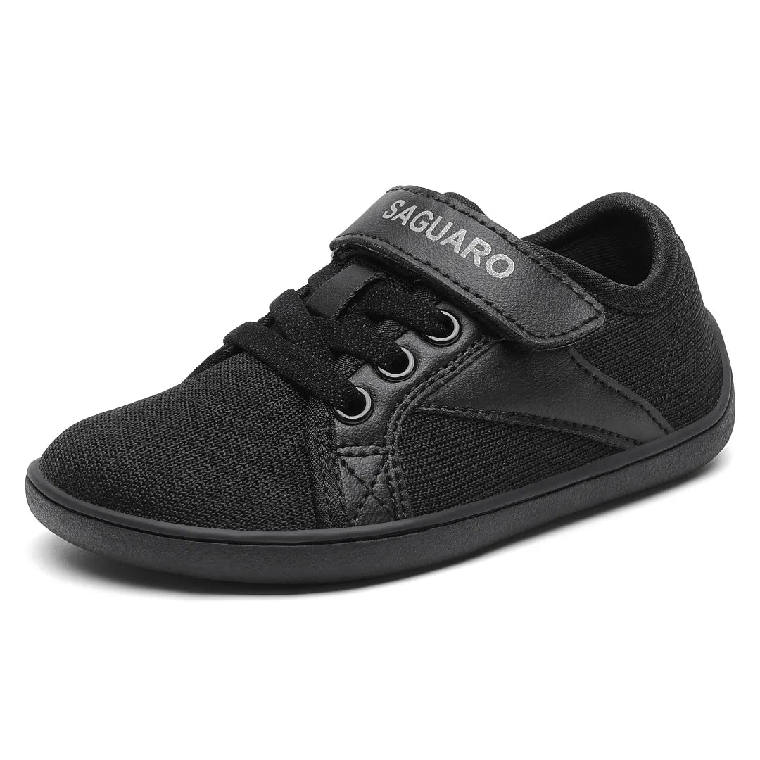 Zapatilla barefoot Saguaro Luck I negra, ideal para colegio, puntera ancha.
