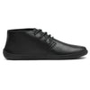 Vista lateral de zapatos barefoot formales negros con suela plana y diseño elegante.